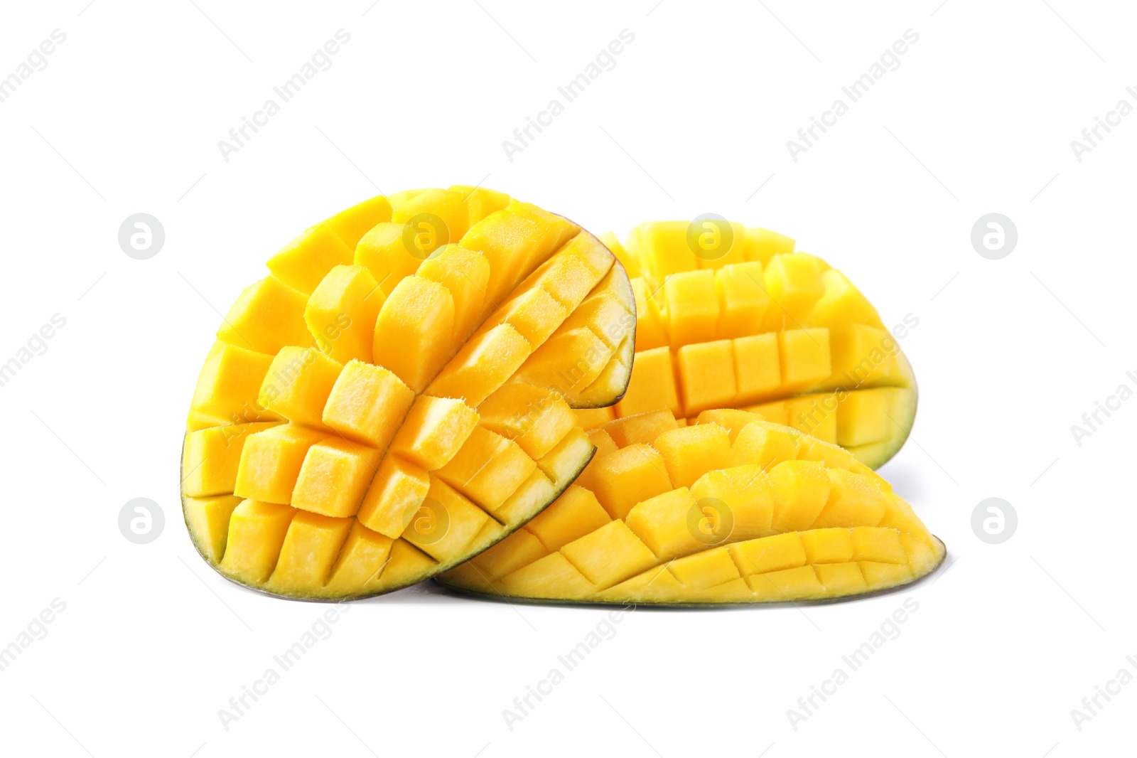 Photo of Fresh juicy mango halves isolated on white