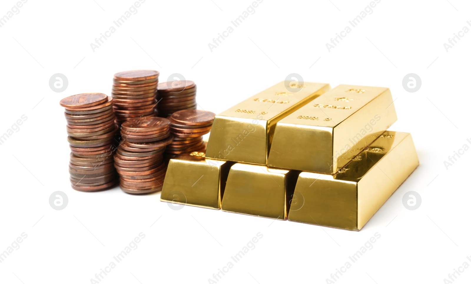 Photo of Shining gold bars and coins isolated on white