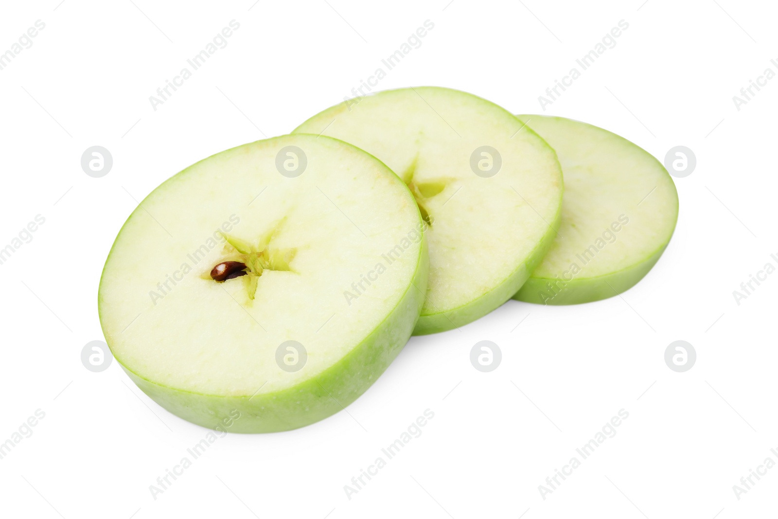 Photo of Slices of ripe green apple isolated on white