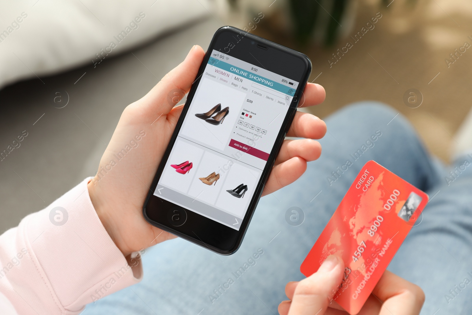 Photo of Woman with credit card using smartphone for online shopping indoors, closeup