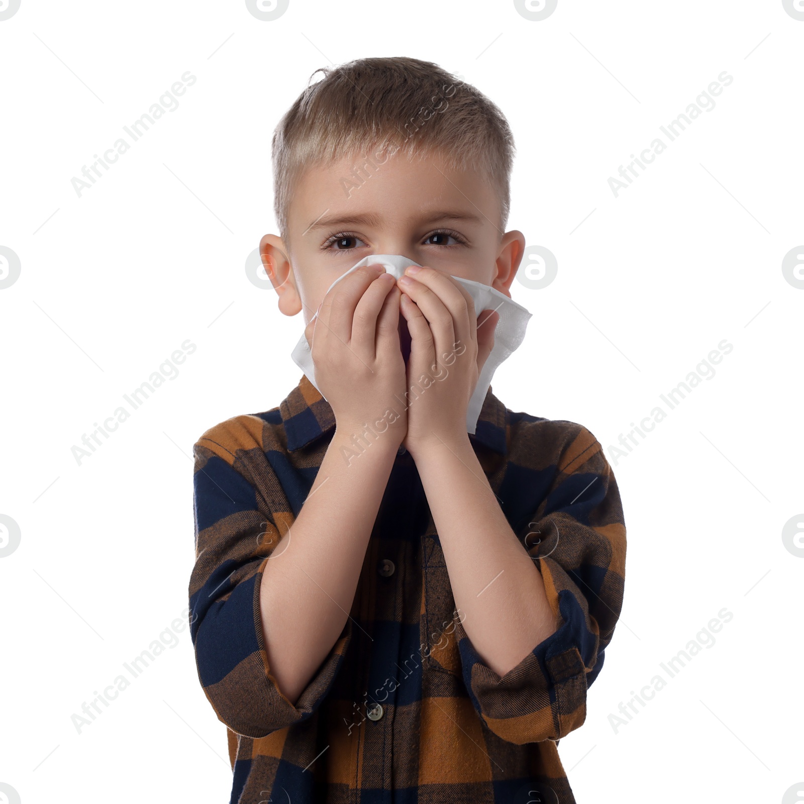 Photo of Sick boy with tissue coughing on white background. Cold symptoms