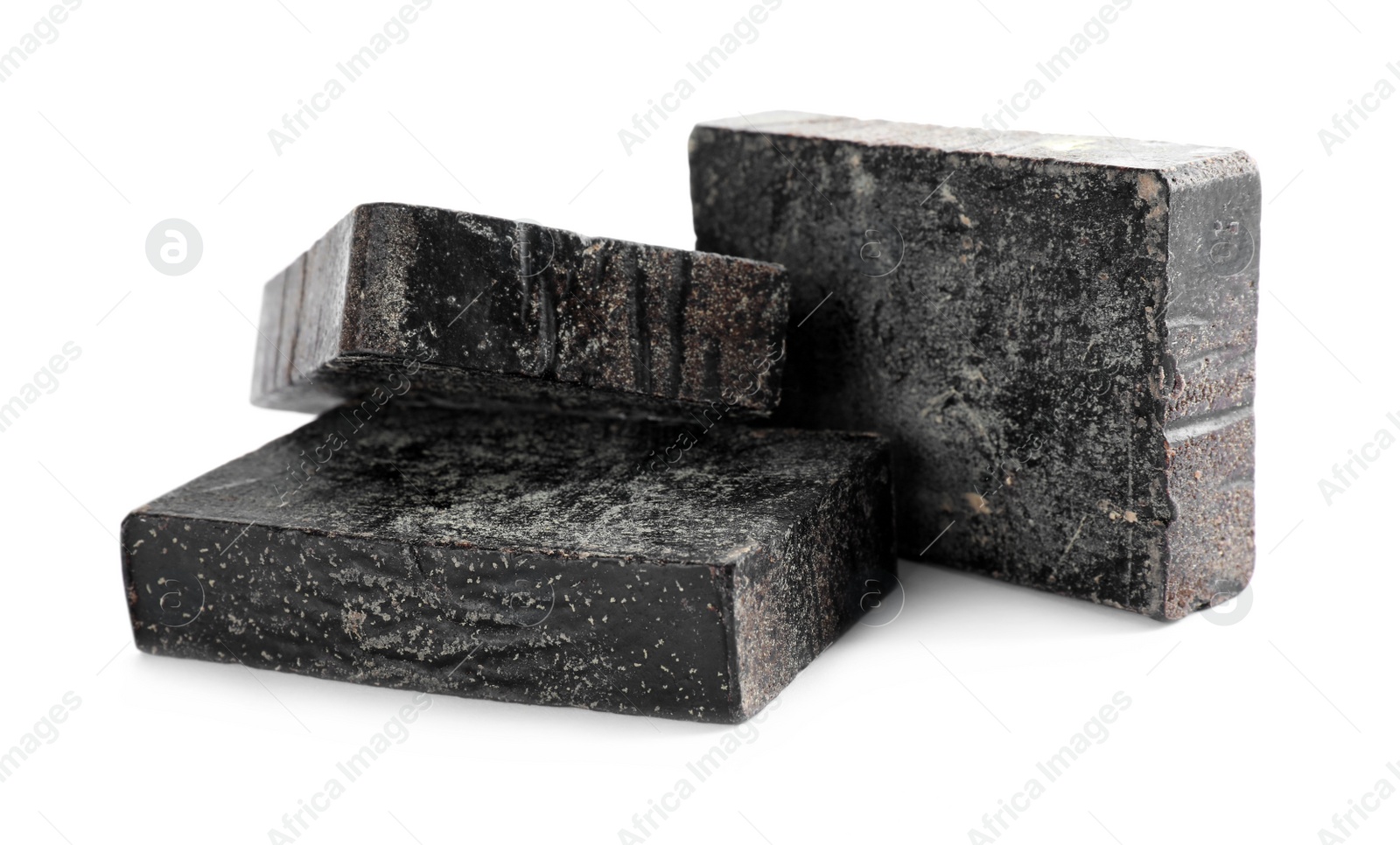 Photo of Tar soap bars isolated on white. Natural product