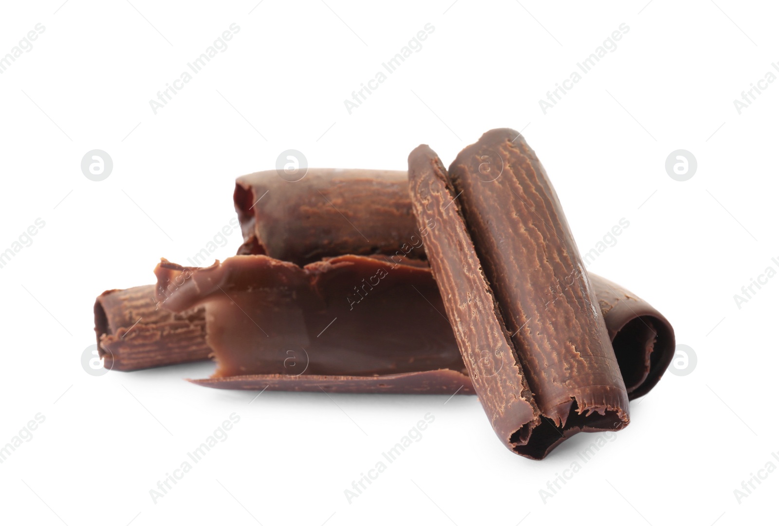 Photo of Delicious black chocolate curls on white background