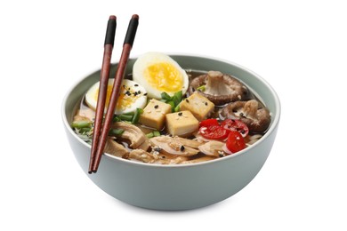 Photo of Bowl of delicious ramen and chopsticks isolated on white. Noodle soup