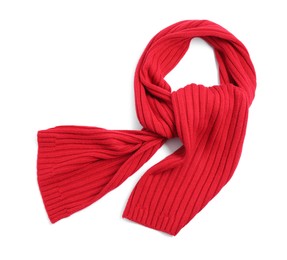 Photo of One red knitted scarf on white background, top view
