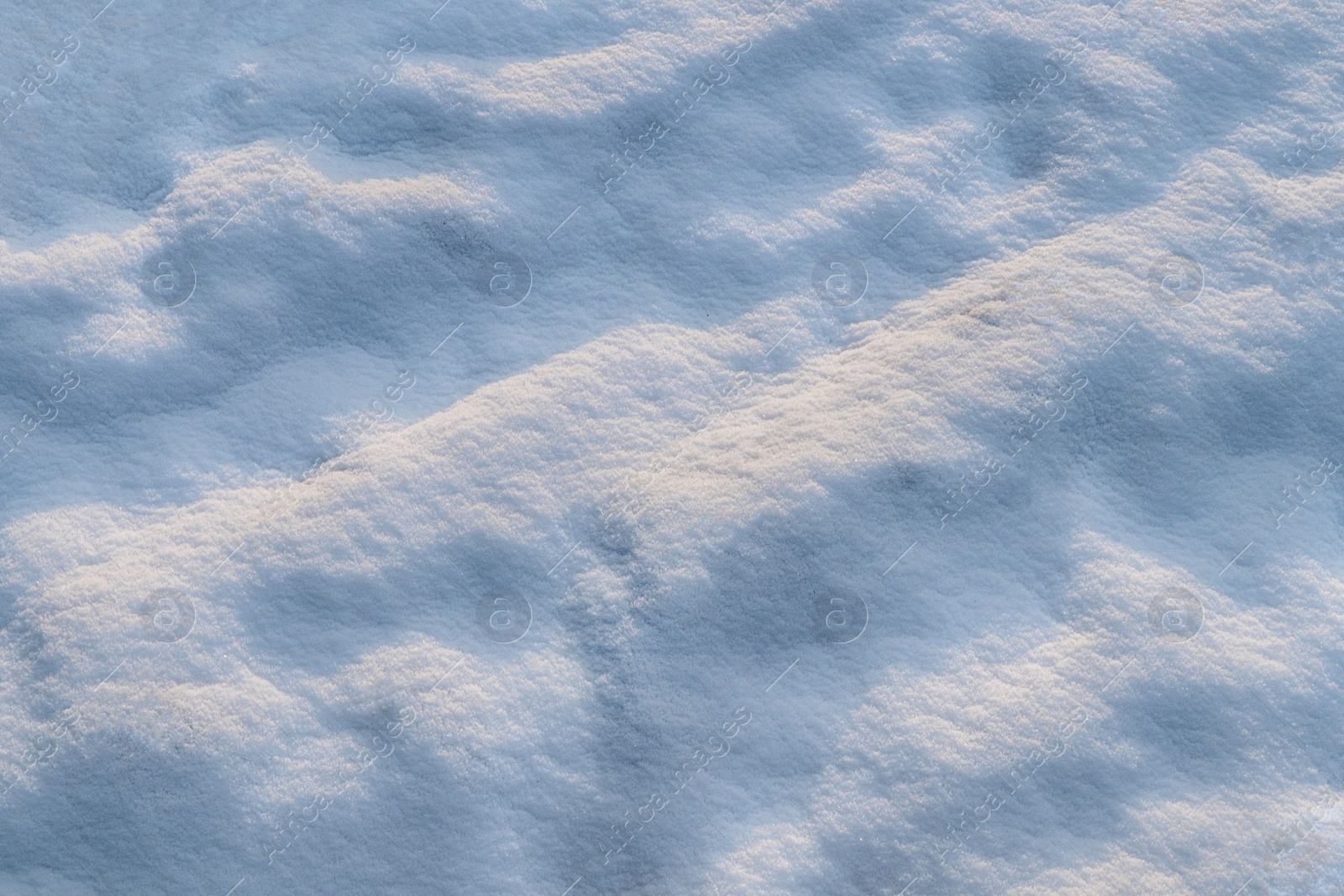 Photo of Beautiful snow as background, closeup view. Winter weather