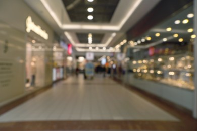 Photo of Blurred view of shopping mall interior. Bokeh effect