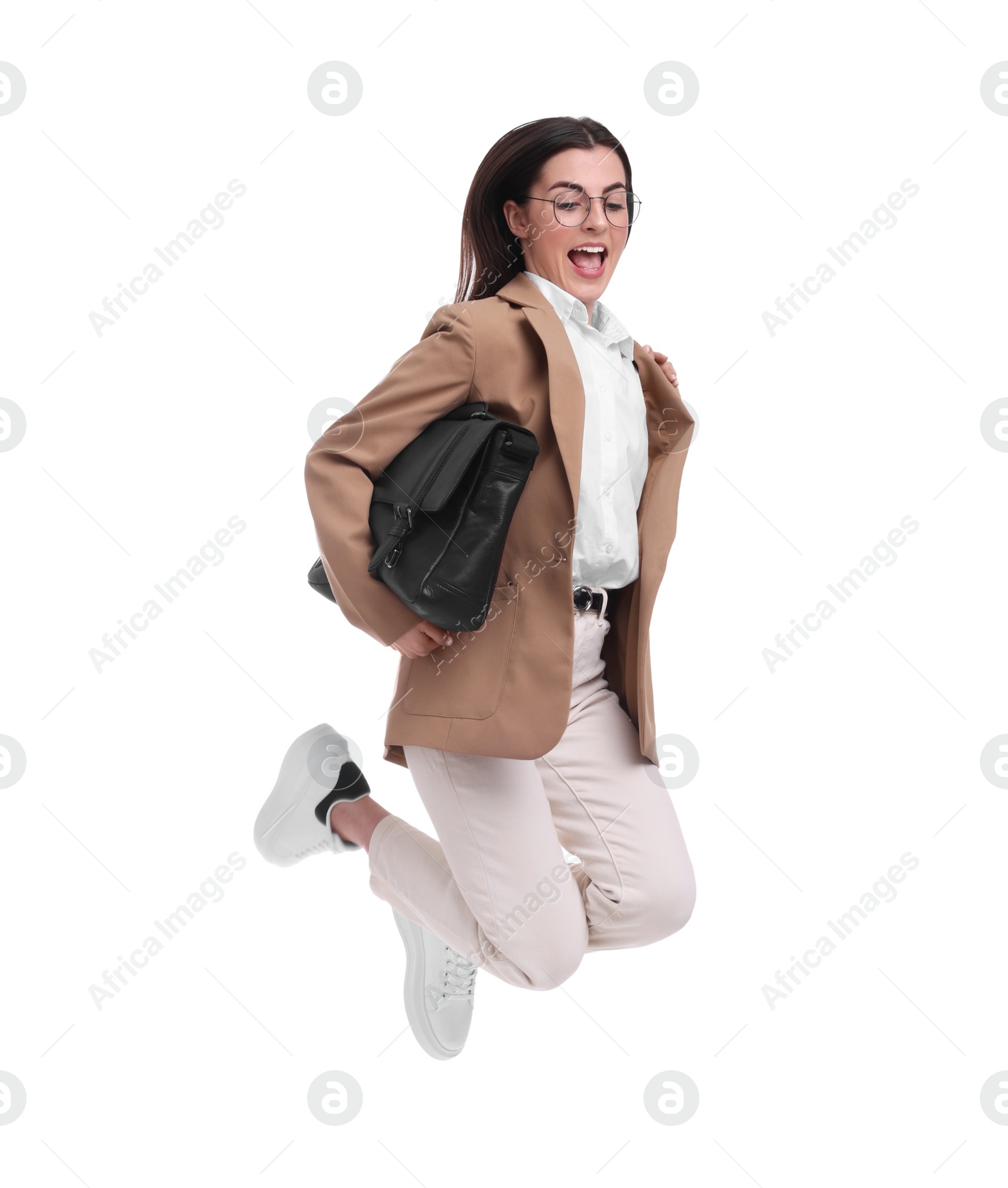 Photo of Beautiful businesswoman with briefcase jumping on white background