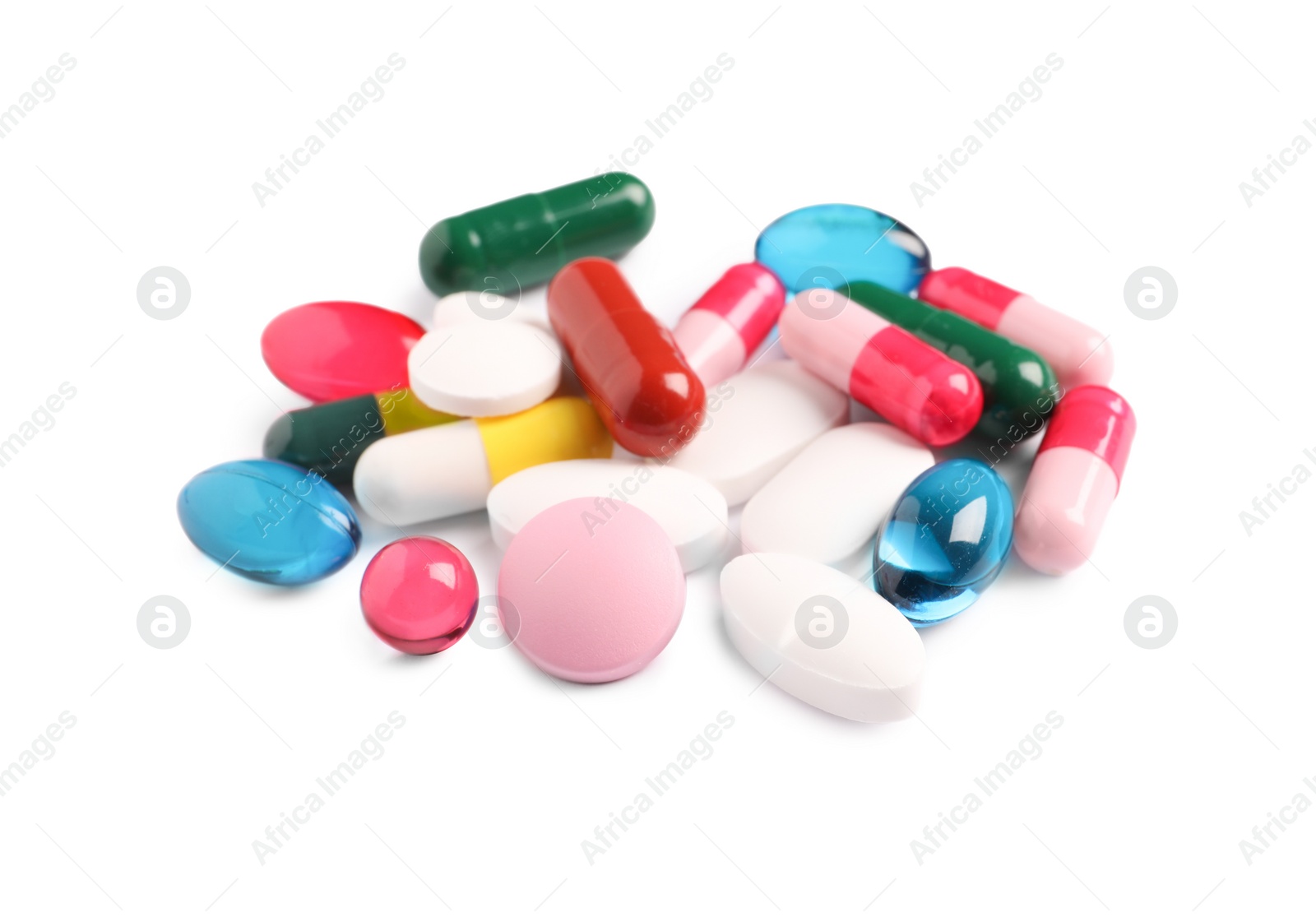 Photo of Many different pills isolated on white. Medicinal treatment