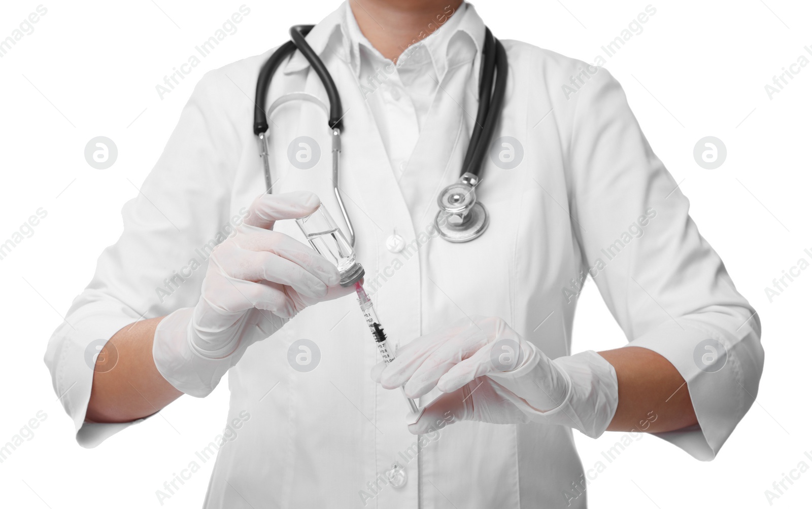 Photo of Doctor filling syringe with medication from glass vial on white background, closeup