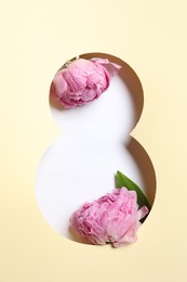 Photo of 8 March greeting card design with pink peony flowers, top view. Happy International Women's Day