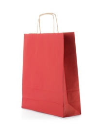 Photo of Mockup of paper shopping bag on white background