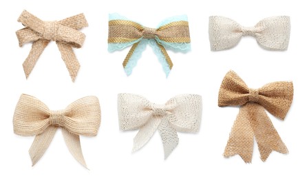 Image of Set with different pretty burlap bows on white background