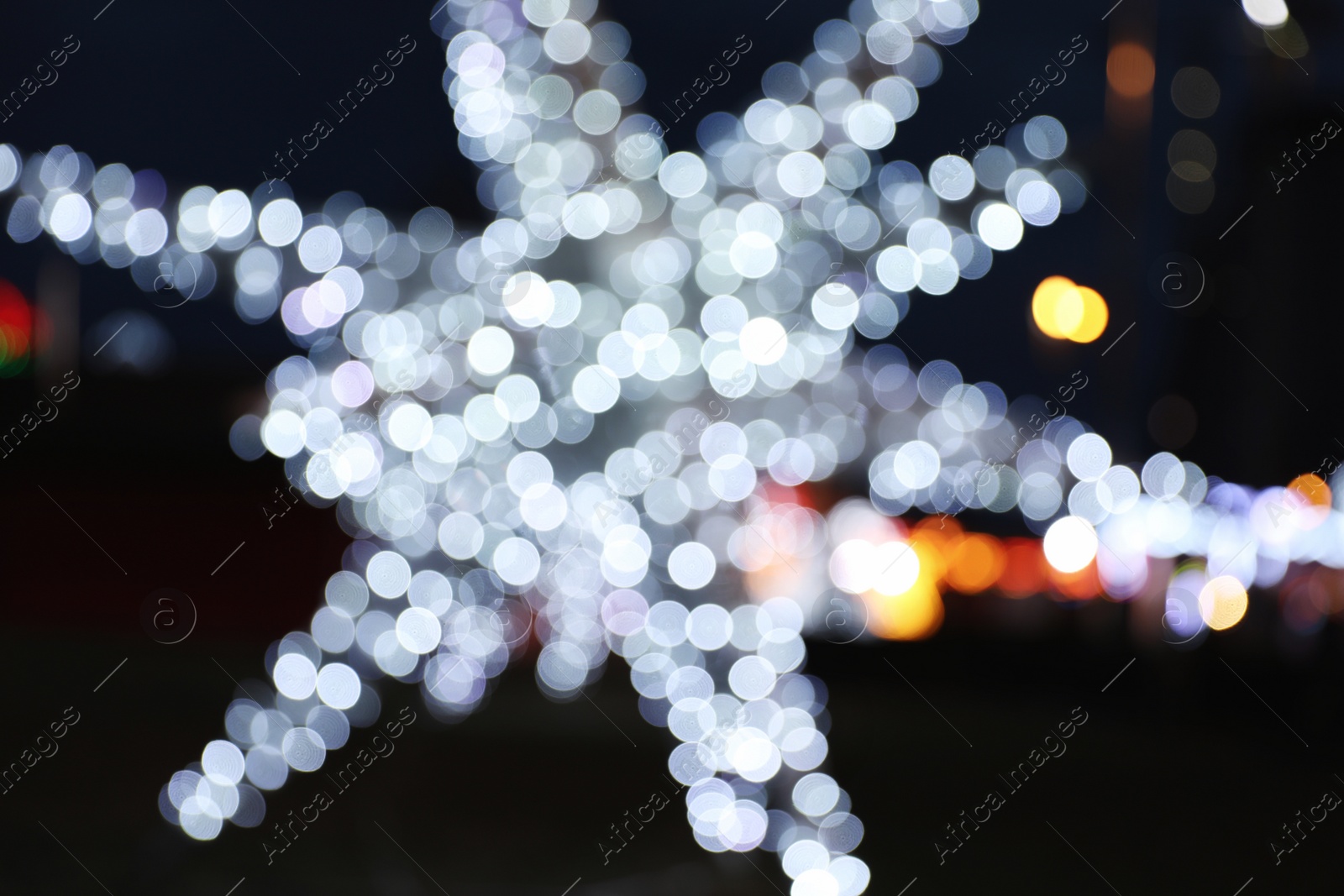 Photo of Beautiful bright Christmas decor outdoors. Bokeh effect