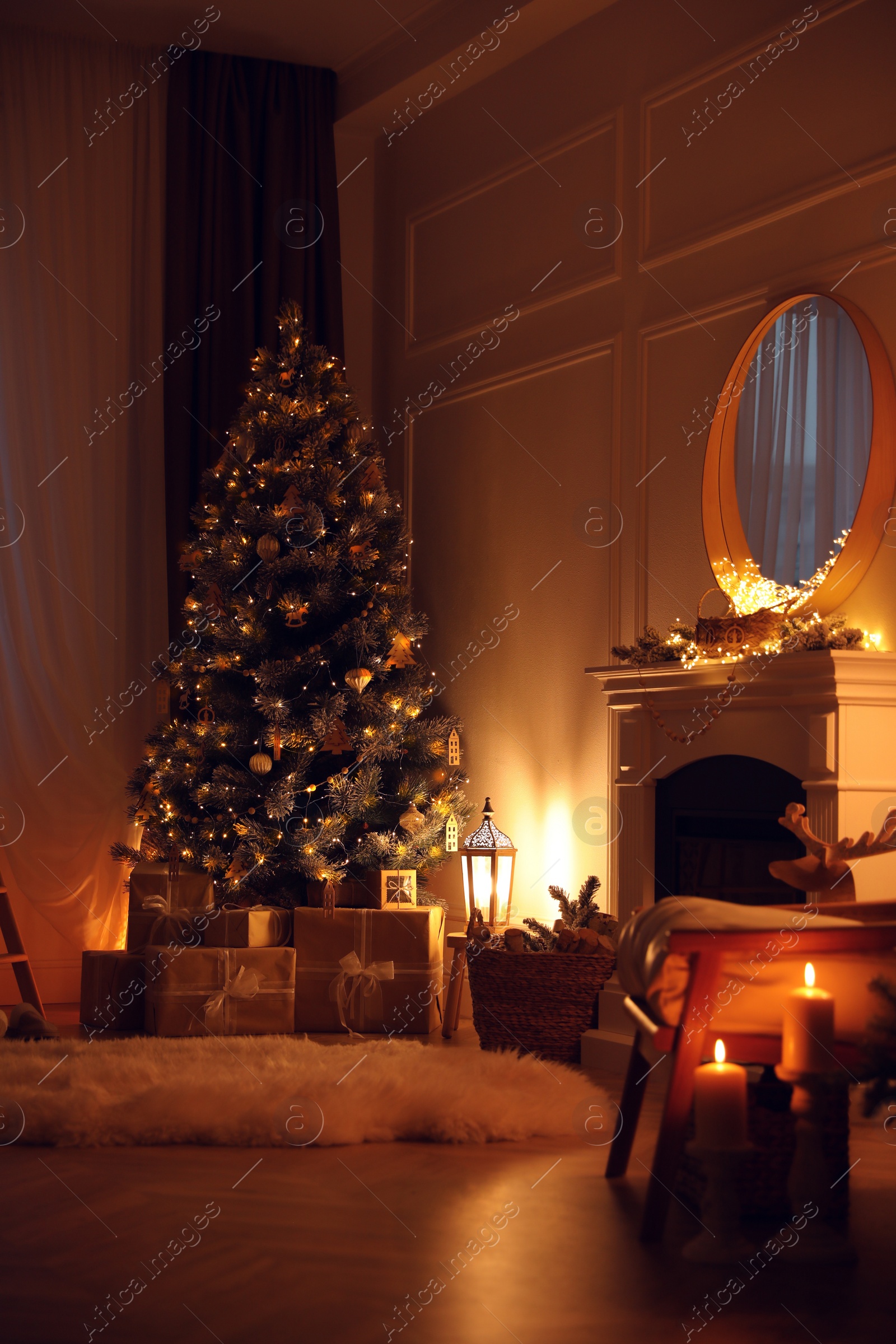 Photo of Beautiful room interior with Christmas tree and fireplace