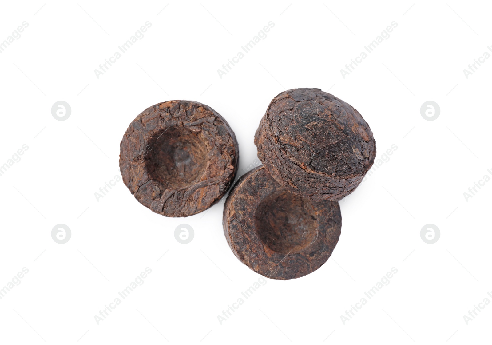 Photo of Cake shaped traditional Chinese pu-erh tea isolated on white, top view