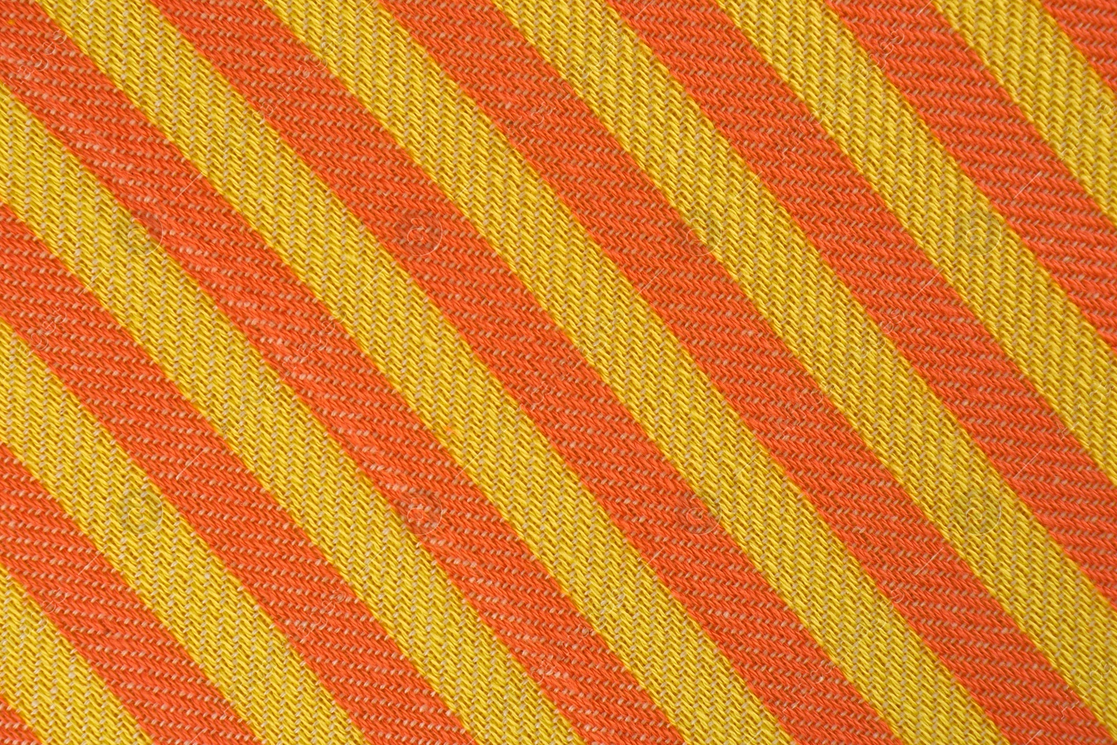 Photo of Striped beach towel as background, top view