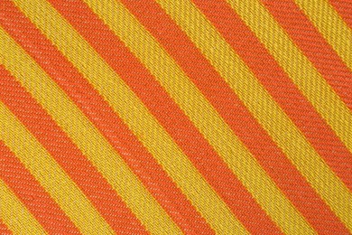 Photo of Striped beach towel as background, top view