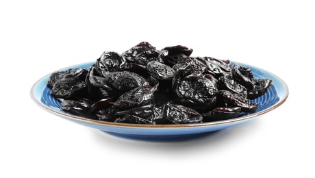 Photo of Plate of tasty prunes on white background. Dried fruit as healthy snack