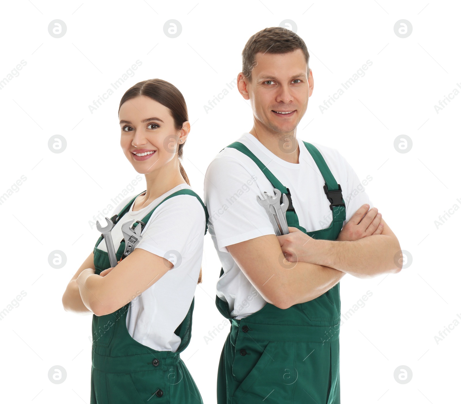 Photo of Portrait of professional auto mechanics on white background