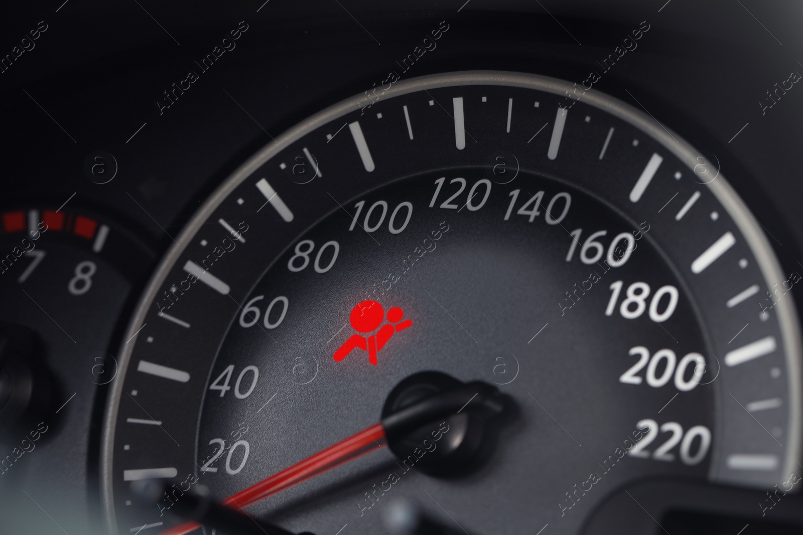 Image of Closeup view of dashboard with warning icon check airbag system in car