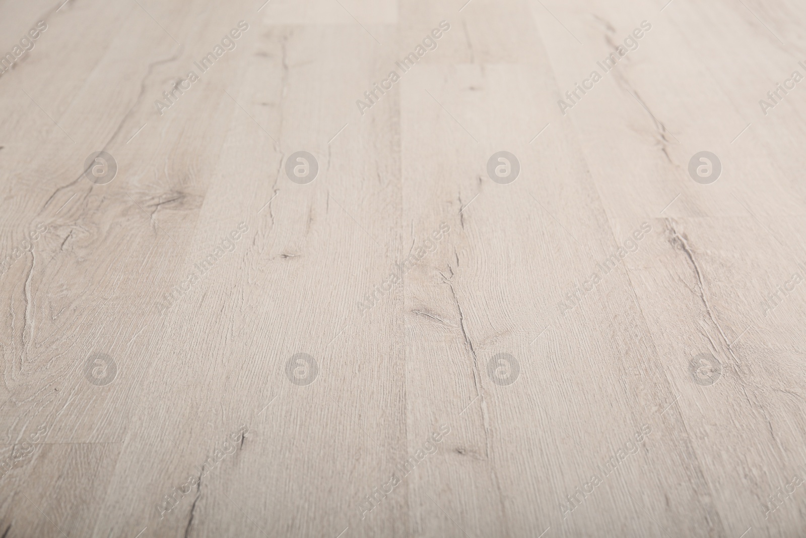 Photo of Light wooden laminate as background. Floor covering