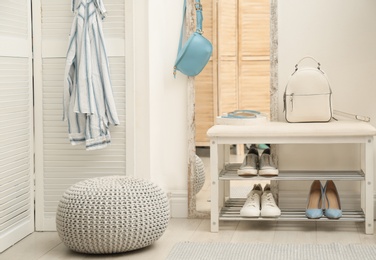 Photo of Cozy hallway interior with storage bench and stylish design elements