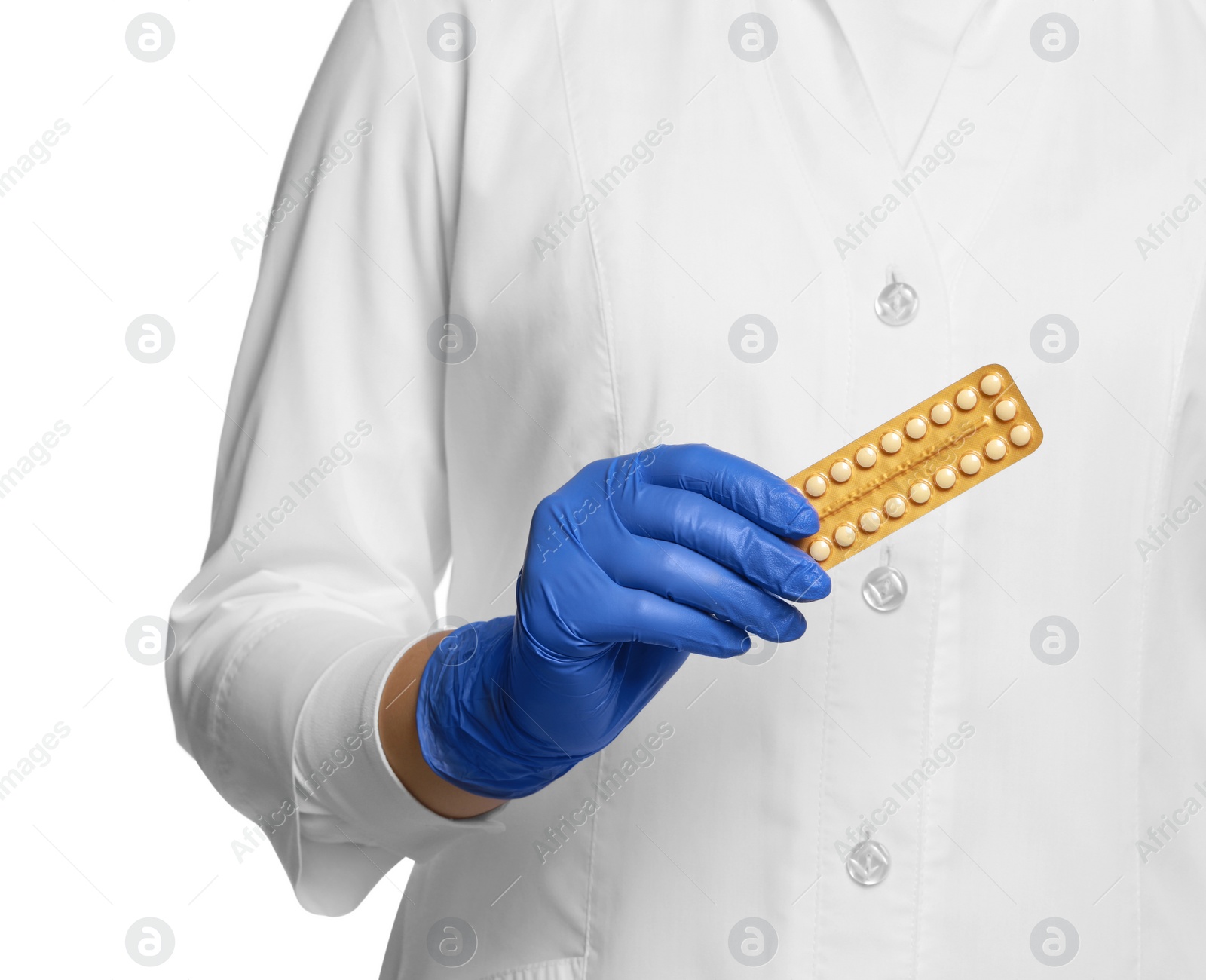 Photo of Doctor holding blister of oral contraception pills on white background, closeup