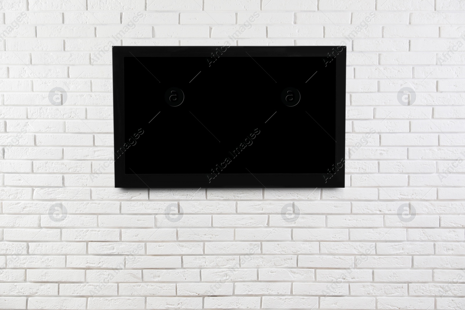 Image of Modern TV on white brick wall. Space for design