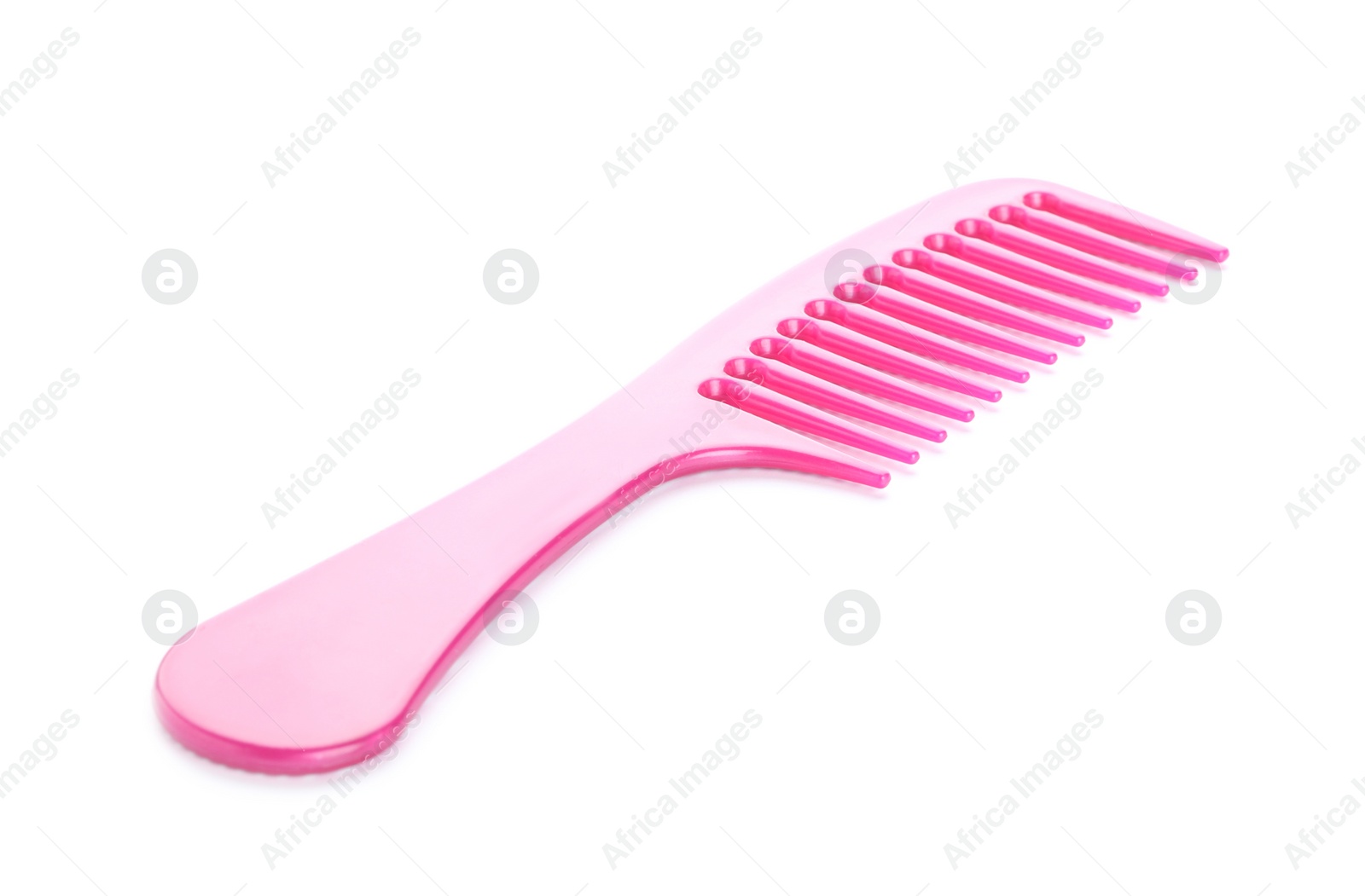 Photo of New pink hair comb isolated on white