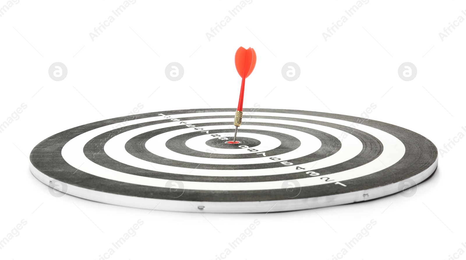 Photo of Red arrow hitting target on dart board against white background