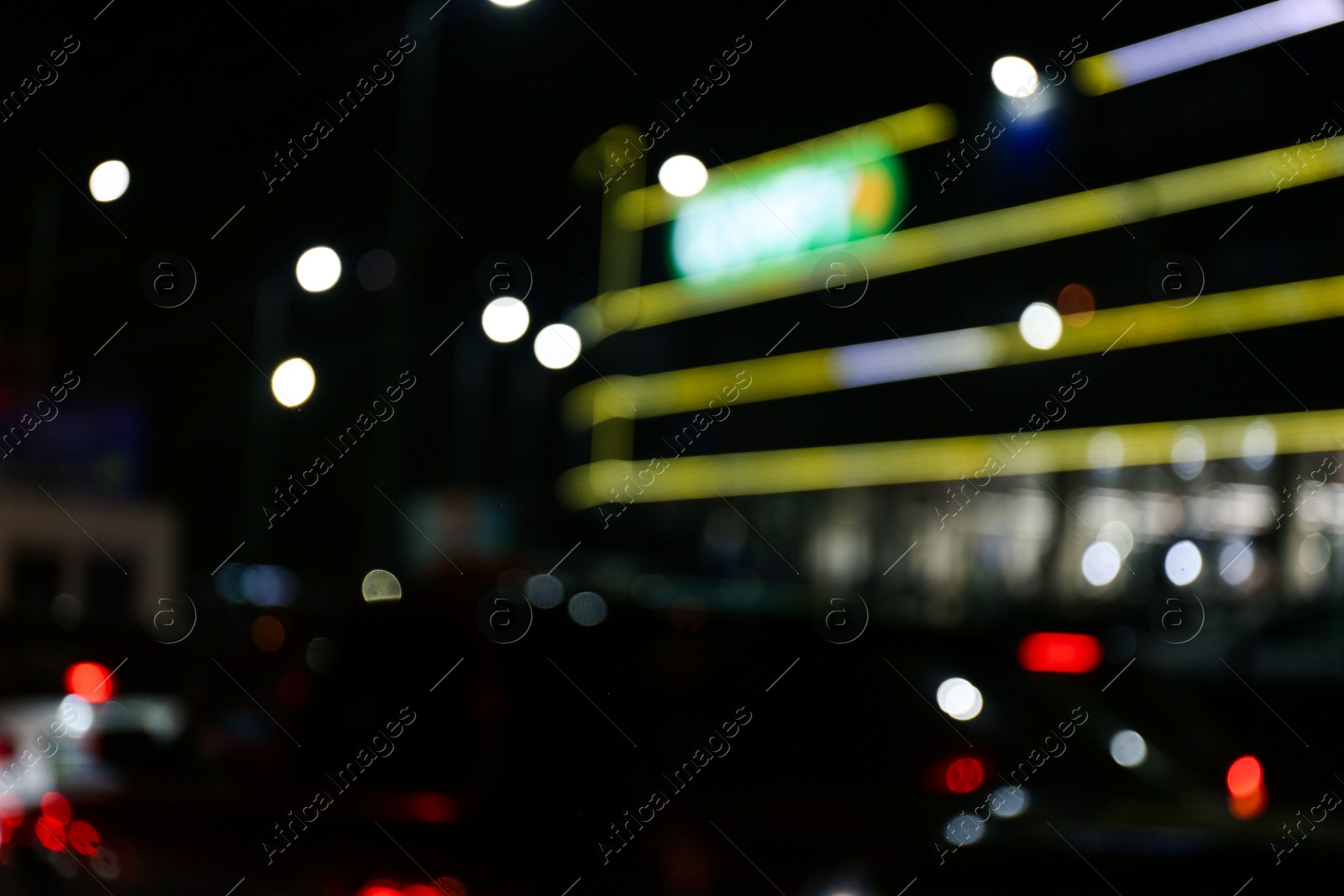 Photo of Blurred view of city at night. Bokeh effect