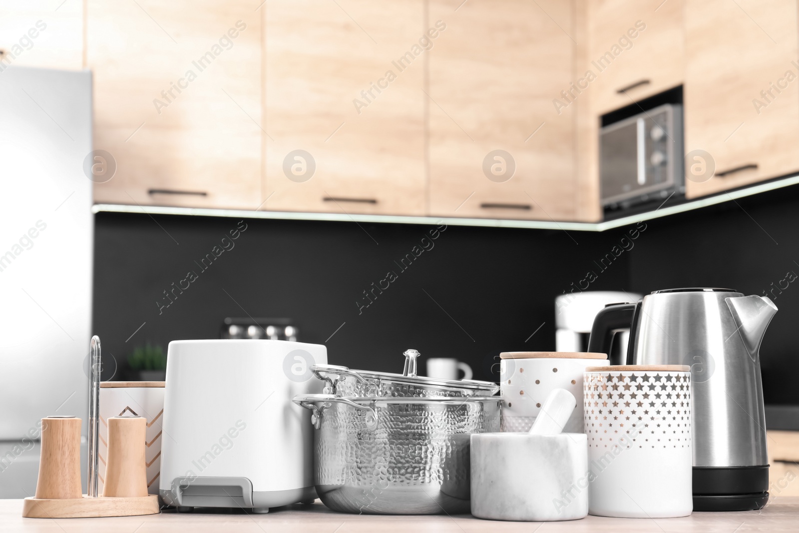 Photo of Set with modern domestic appliances in kitchen