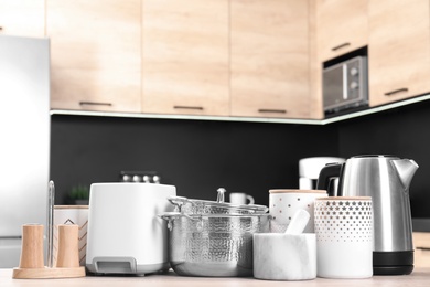 Set with modern domestic appliances in kitchen