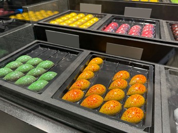 Showcase with different delicious desserts in store