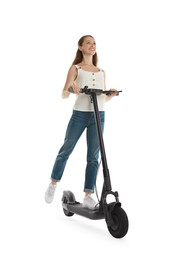 Happy woman riding modern electric kick scooter on white background