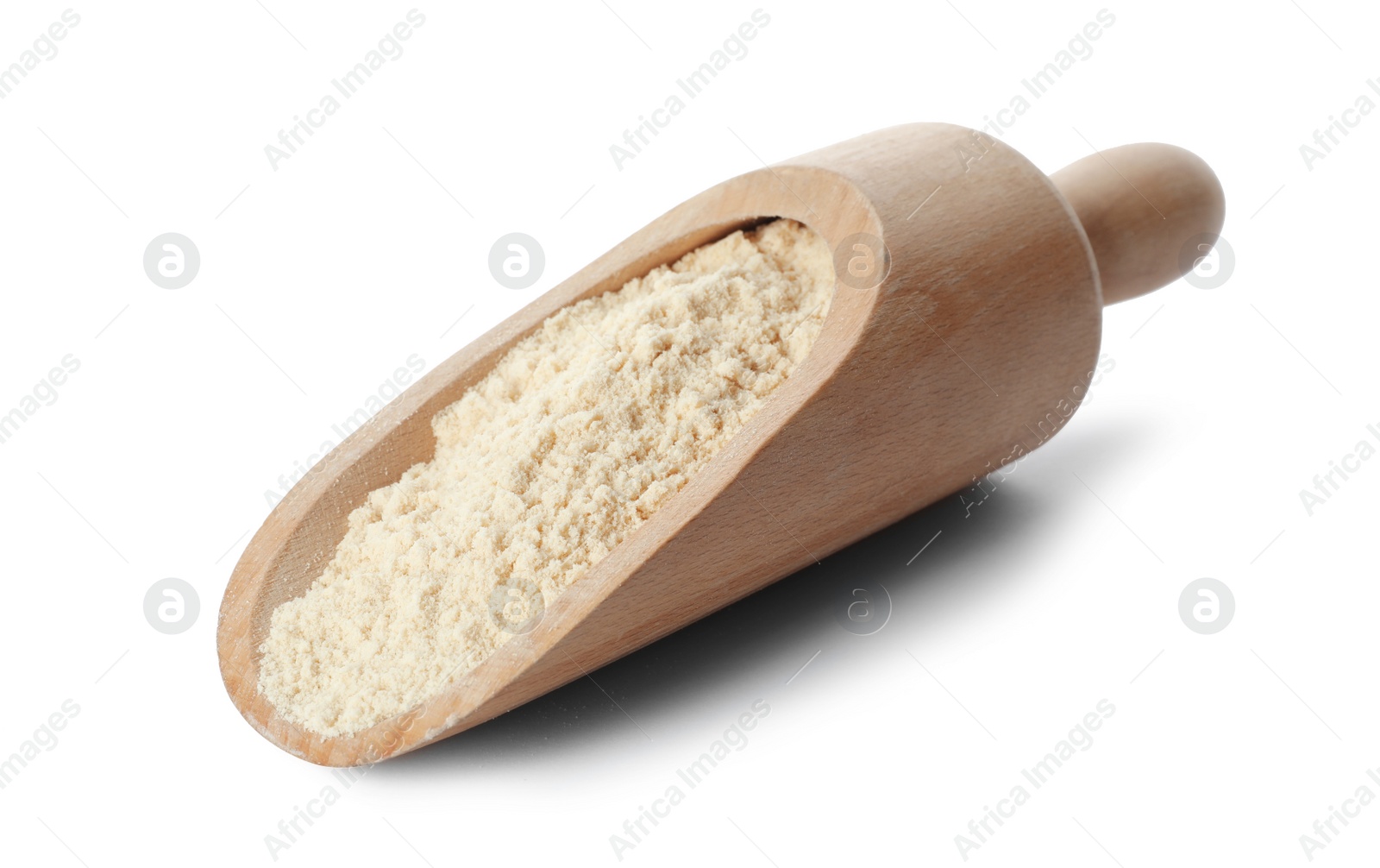 Photo of Scoop of sesame flour isolated on white