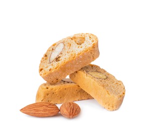 Slices of tasty cantucci and nuts on white background. Traditional Italian almond biscuits