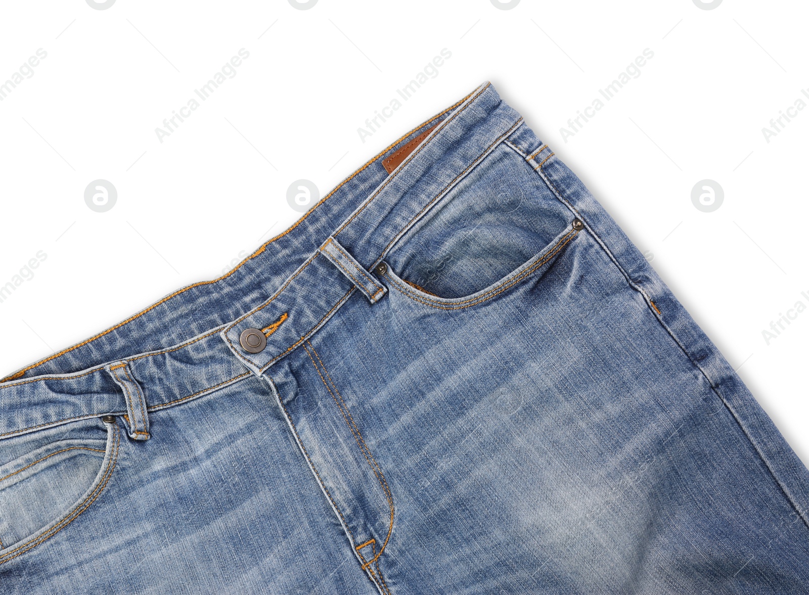 Photo of Stylish light blue jeans isolated on white, top view