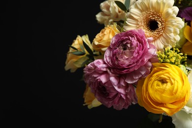 Beautiful fresh flowers on dark background, closeup