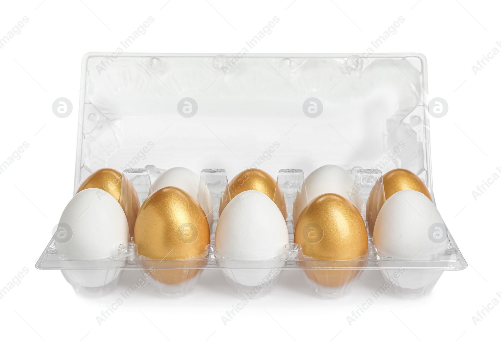 Photo of Plastic container with golden eggs and ordinary ones on white background