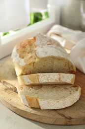 Freshly baked sourdough bread on light table