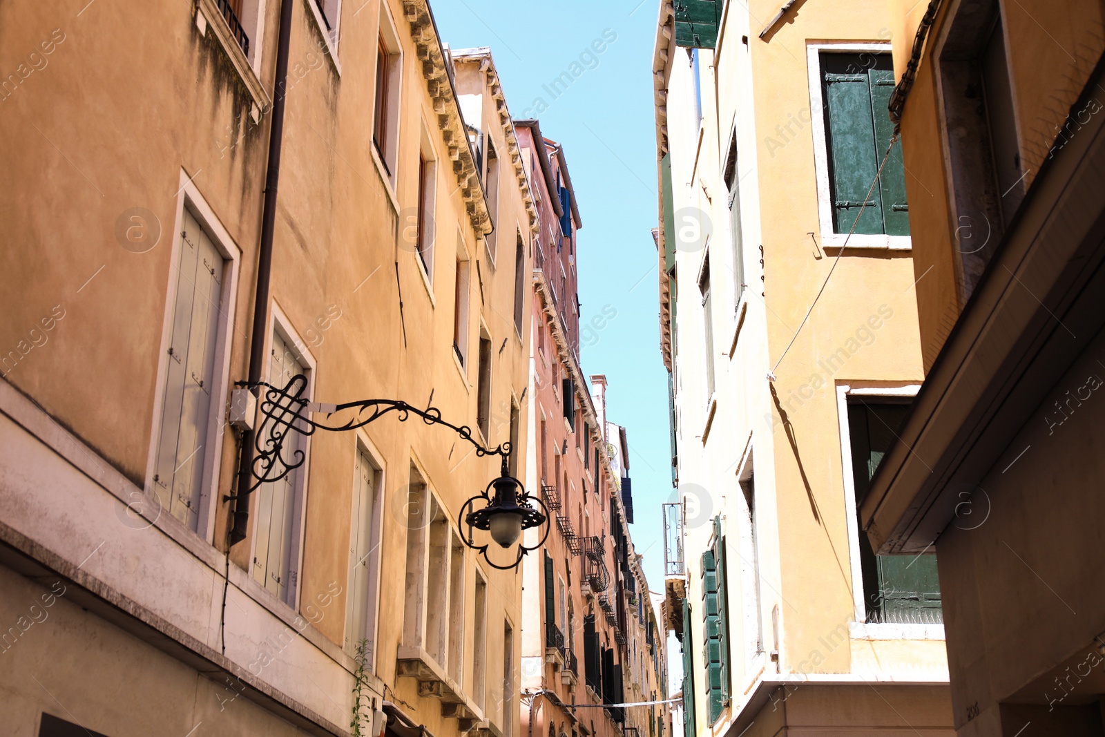 Photo of View of beautiful old buildings with windows