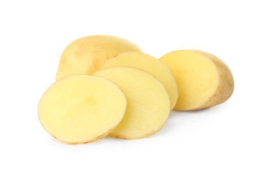 Whole and cut fresh raw organic potatoes on white background