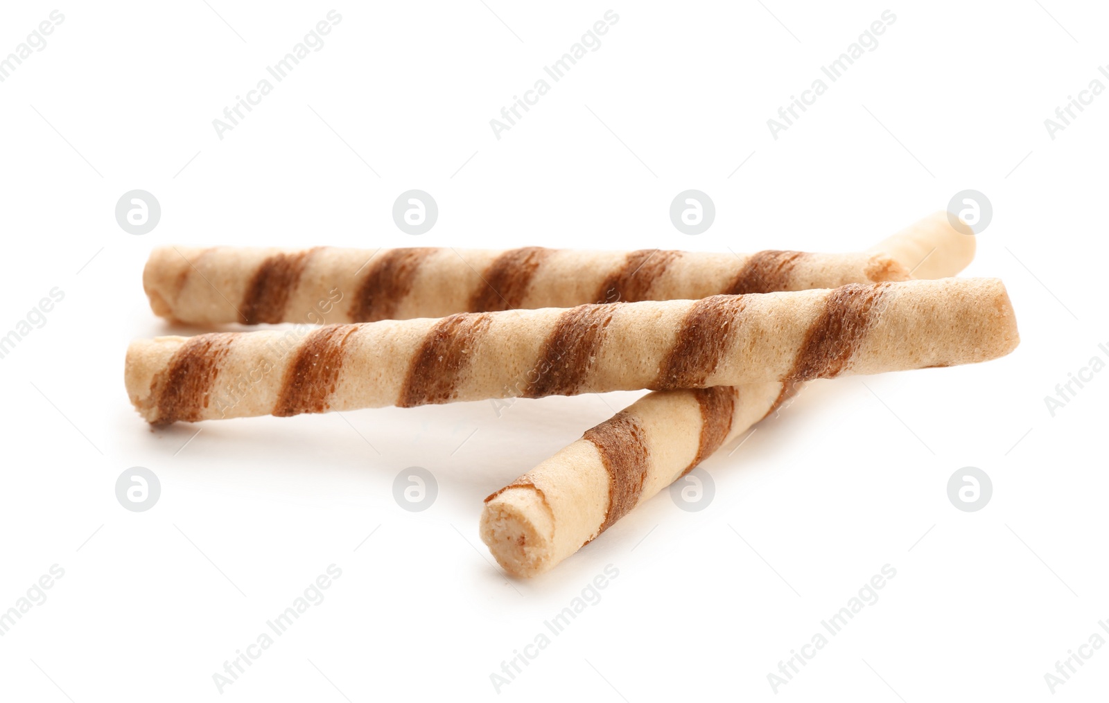 Photo of Tasty wafer roll sticks on white background. Crispy food