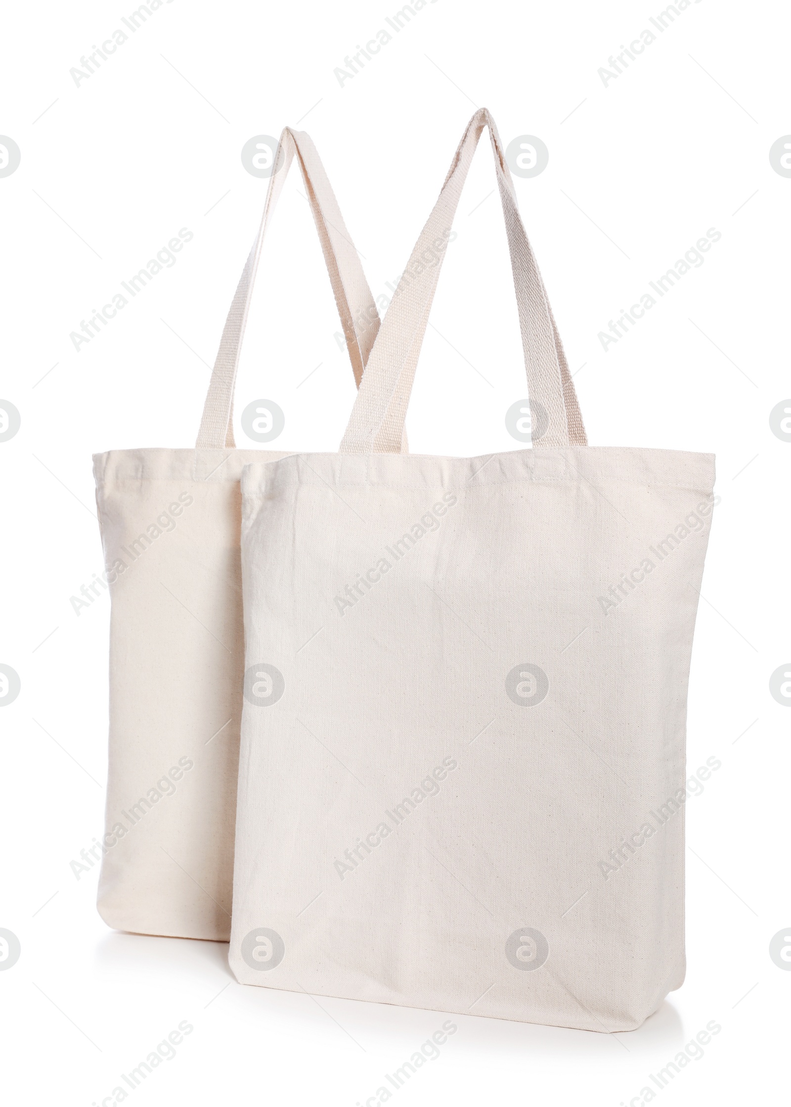 Photo of Eco bags on white background. Mock up for design