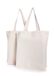 Photo of Eco bags on white background. Mock up for design