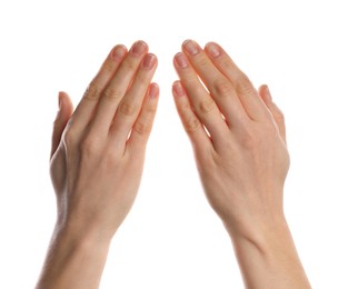 Photo of Religion. Woman with open palms praying on white background, closeup