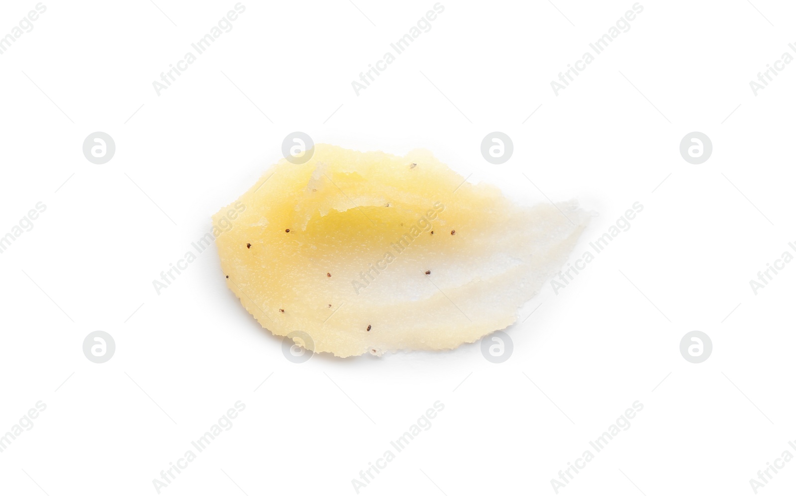 Photo of Smear of yellow body scrub isolated on white, top view