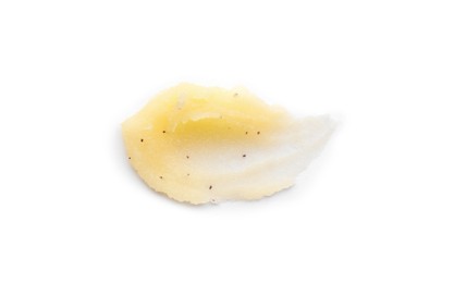 Photo of Smear of yellow body scrub isolated on white, top view